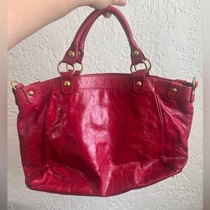 Maurizio Tauiti leather bag red. Genuine leather